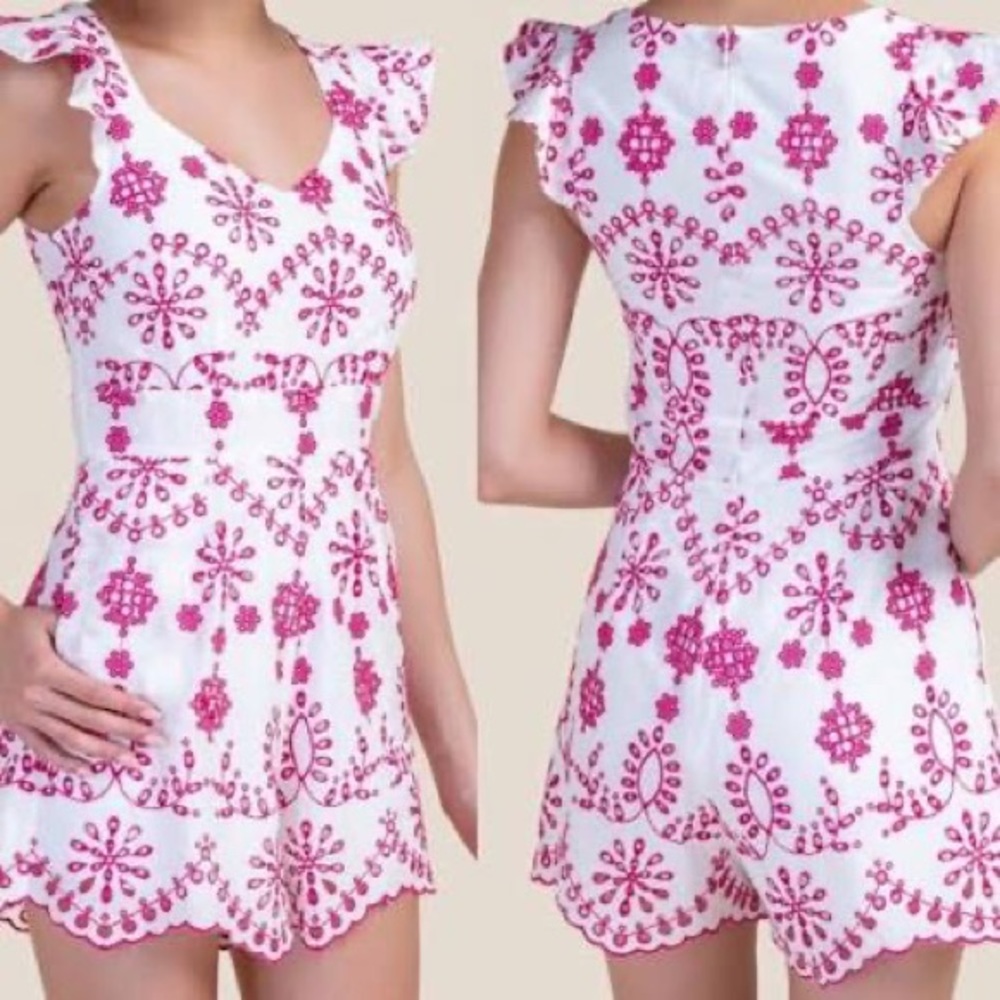White and pink romper. Embroidered pattern. Great condition.